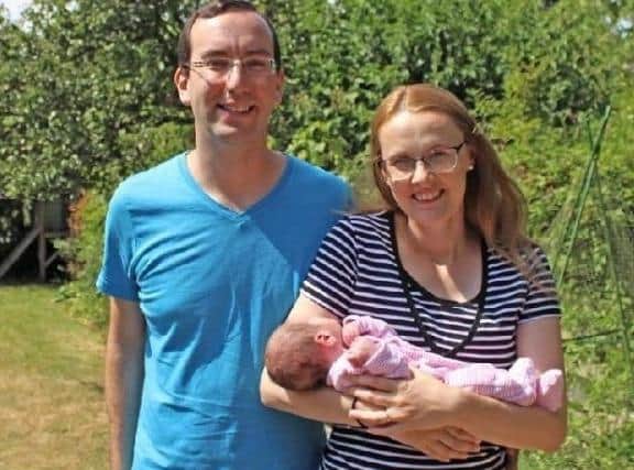 Cat Smith with her son Elijah and husband Ben