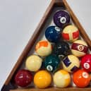 A set of pool balls are a cheaper way to get into the sports memorabilia market