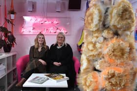 Eve Astle and Amanda Odlin-Bates, UCLan fashion lecturers, with a dress made by one of their students using cardboard pizza bases.