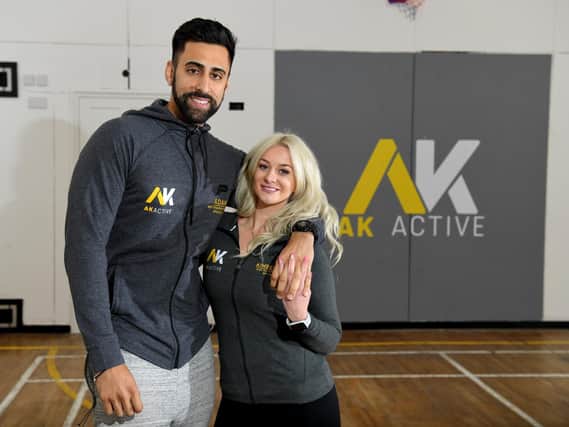 Adam and Kimberley Badat, who own fitness studio AK Active in Lostock Hall, are challenging people to buy as many essential items as they can for the town's food bank for 10.