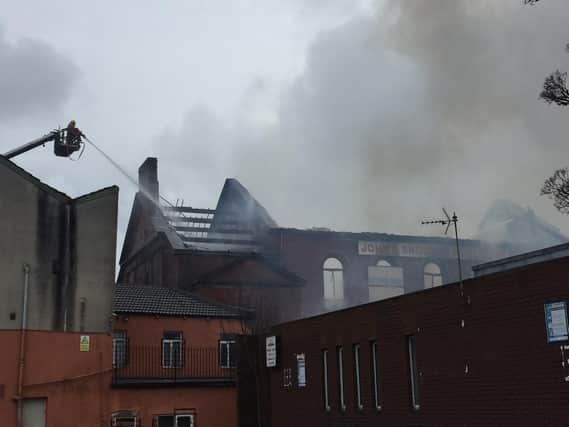 The roof has collapsed at the building (credit: LFRS)