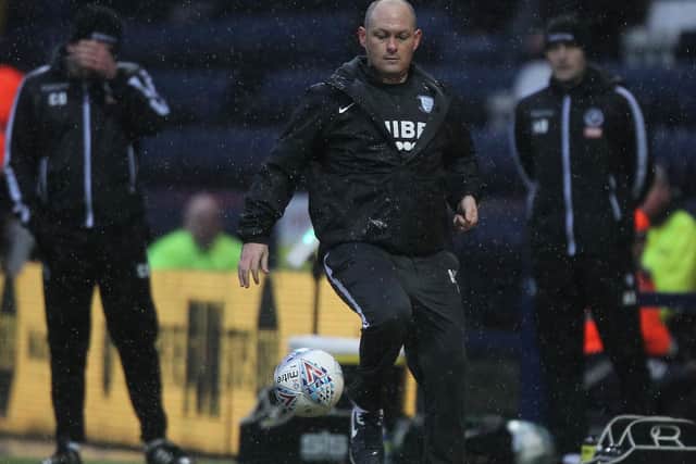 Alex Neil shows some nifty footwork on the touchline at Deepdale