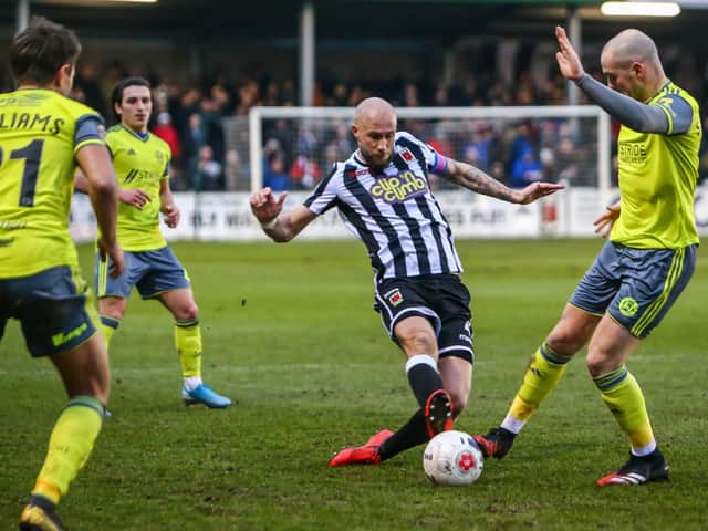 Chorley skipper Andrew Teague in action against FC Halifax Town
Photo: Stefan Willoughby