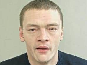 Daniel Edmundson (pictured) has a number of tattoos including an angel on his left arm and a Japanese symbol on his upper arm. (Credit: Lancashire Police)