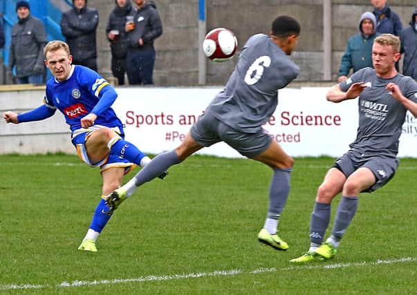 Lancaster City's Charlie Bailey blasts a shot at goal during the 1-1 draw versus Witton Albion on Saturday.Picture: Tony North