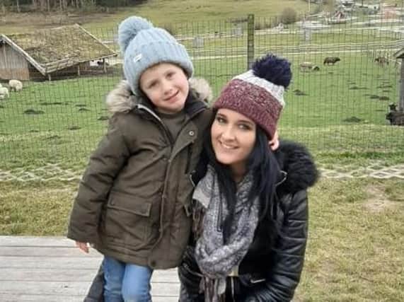 Chloe Jo, who is setting up a Lostock Hall coronavirus support group, with one of her three children.