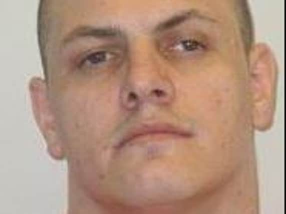 Ben Fay, 28, from Rochdale, has been detained at a Manchester police station after failing to return to HMP Kirkham in October 2019. Pic: Lancashire Police