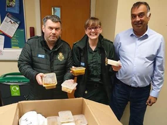 Faruk Malek, of the Silk Route restaurant, delivers food to Royal Preston Hospital staff