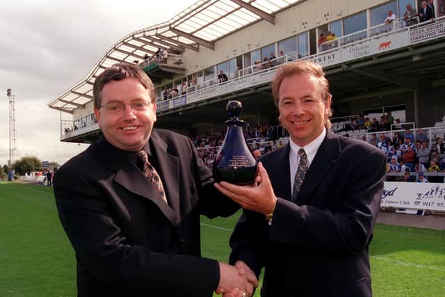 PNE vice-chairman Derek Shaw receives a glass trophy from Bristol Rovers's Geoff Dunford to mark Preston's 4,000th league game in September 1998