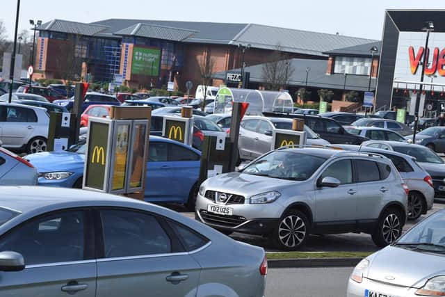 Customers queuing at McDonald's in Capitol Centre, Preston this afternoon (March 23)