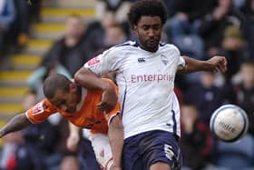 Former North End defender Youl Mawene in derby action against Blackpool for Preston