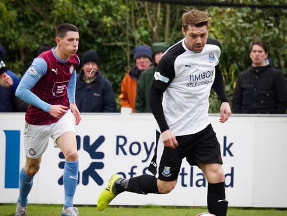 Bamber Bridge's Alistair Waddecar in action against South Shields earlier this season