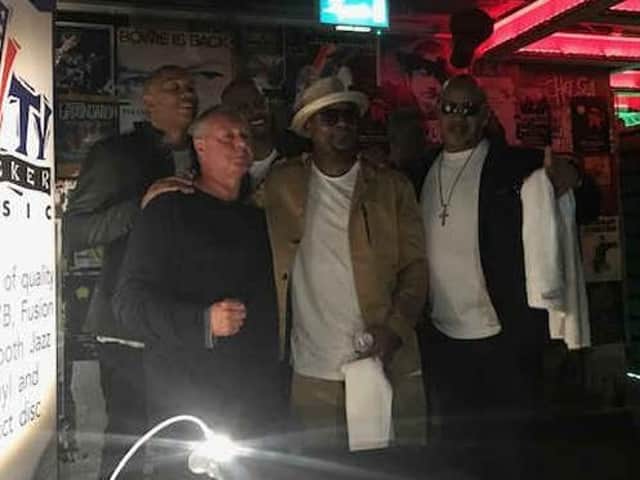 Chris Walls, the man behind Cityslickermusic, is pictured here on the far left