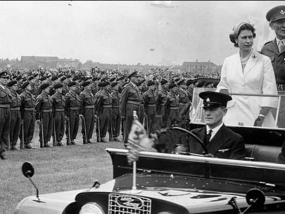 Queen, Colonel-in-Chief of The Loyal Regiment (North Lancashire), reviewing the 1st Battalion on Stockton-on-Tees Racecourse in May 1956