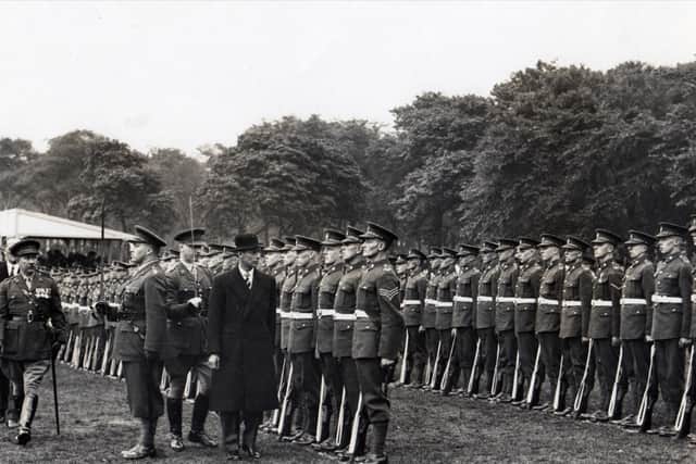 King George VI inspects troops of the Loyal Regiment on Moor Park, Preston, in 1938