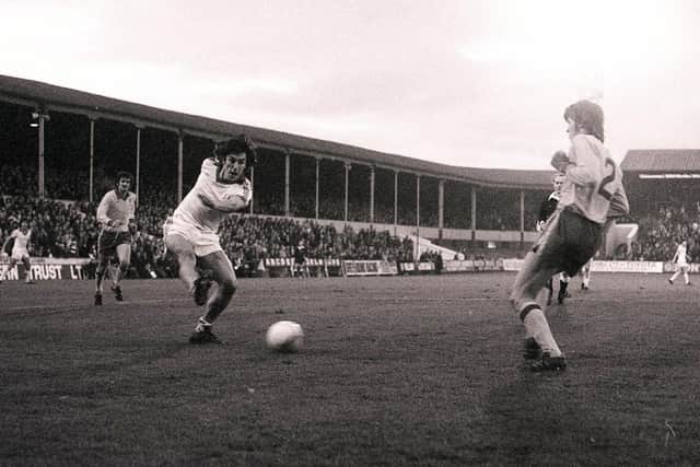 Mike Elwiss puts over a cross in PNE's win over Lincoln City in the FA Cup in 1977