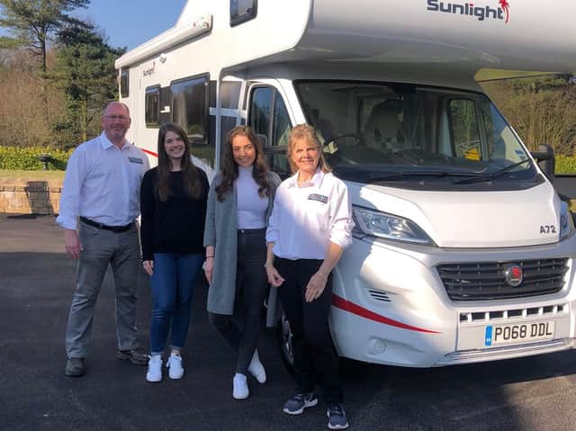 Glen, Charlotte, Katie and Cindy Campbell with one of their motorhomes.