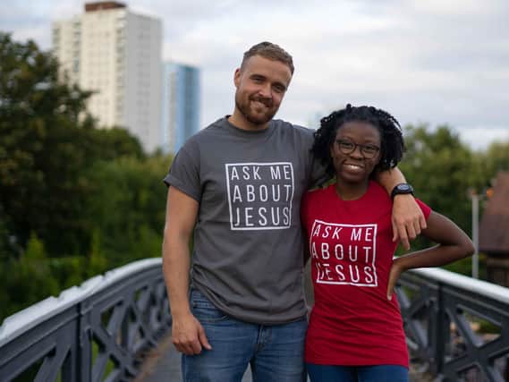 Laura Jeffers and her friend Ricky wearing Stay Lit Apparel t-shirts.