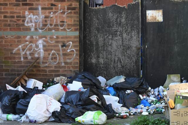 Residents have flytipped waste in a Preston alleyway