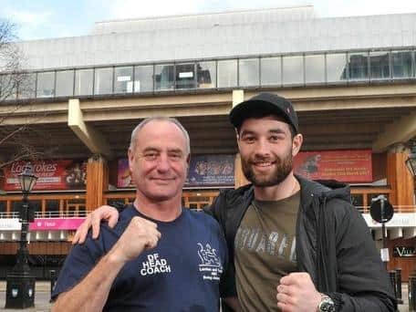 Prestons British boxing champion Scott Fitzgerald, right, with his dad Dave. Copyright: jpimediaresell