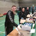 Police staff help out at the emergency hub at Salt Ayre
