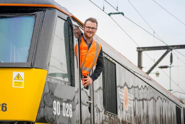Grand Central's Paul Batty and a Grand Central Class 90 locomotive to be used on the Lancashire to London direct services