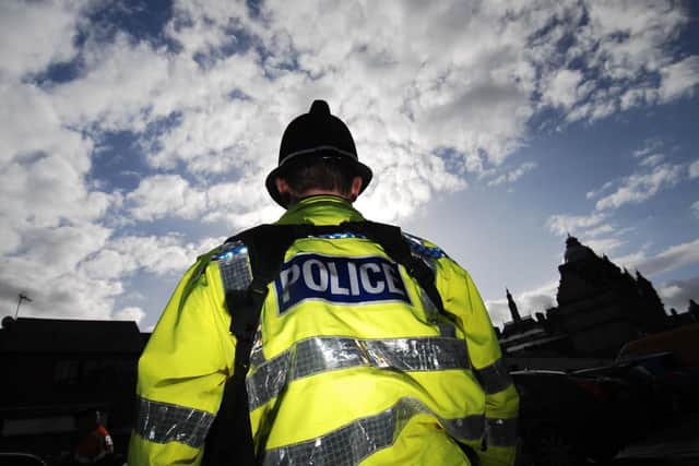 A teenage girl was arrested after spitting at a PCSO.