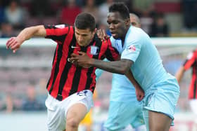John Mousinho in action for Preston North End against Coventry in 2013