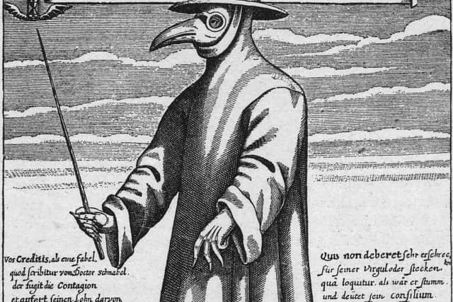 A plague doctor in protective clothing circa 1656