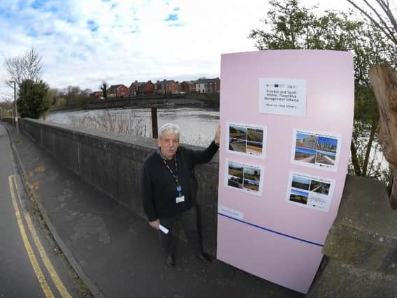 David Blake of Environment Agency with the mock up of the proposed wall at the River Ribble flood defence meeting in Penwortham