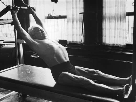 Joseph Pilates exercising at his studio in New York City, circa 1960