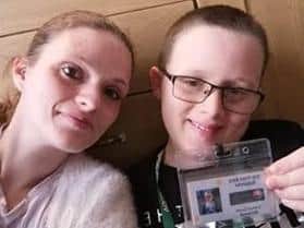 Joshua with his mum Nicola and his badge