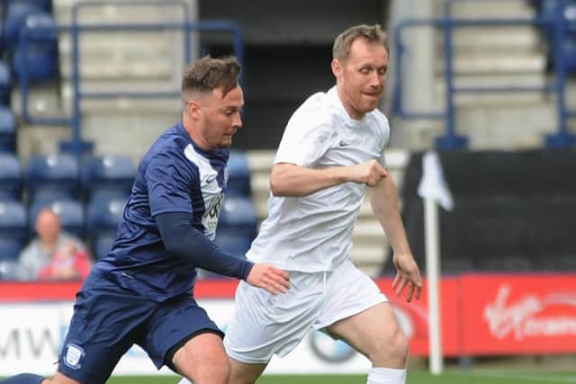 Ormerod (right) in action in a charity match