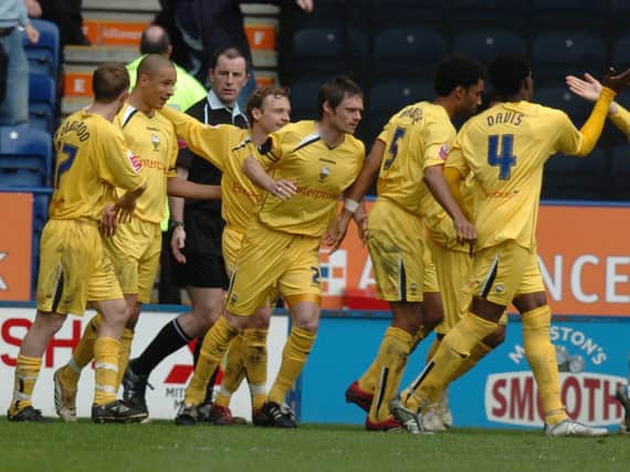 Jason Jarrett (second left) is congratulated after scoring Preston North End's winner against Leicester at the Walkers Stadium on April 15, 2006
