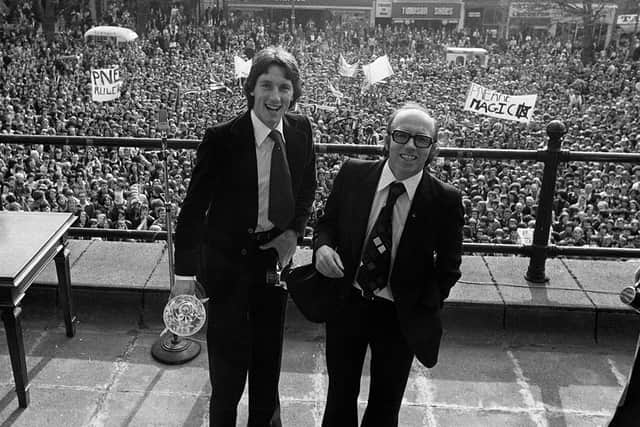 Mike Elwiss and Nobby Stiles on the Harris Museum steps as PNE fans celebrate promotion of the Flag Market below in 1978