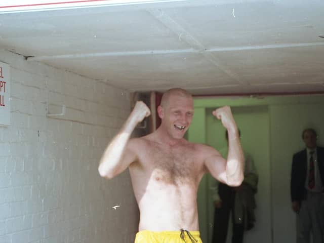 Andy Saville celebrates the 2-0 win at Leyton Orient which clinched promotion for Preston North End