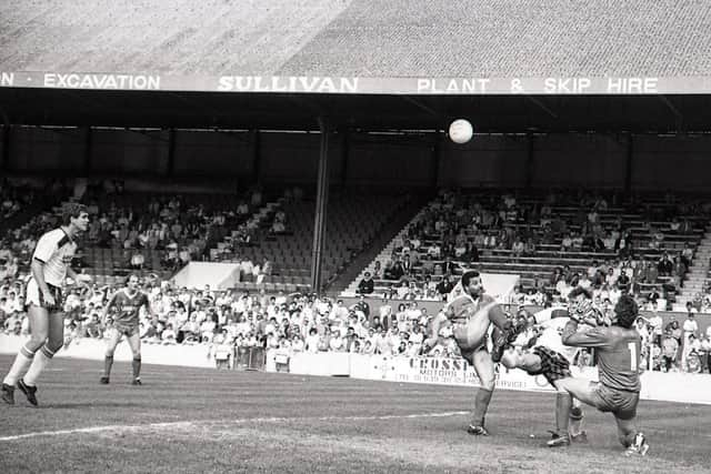 A scramble in the penalty box during PNE's victory at Orient