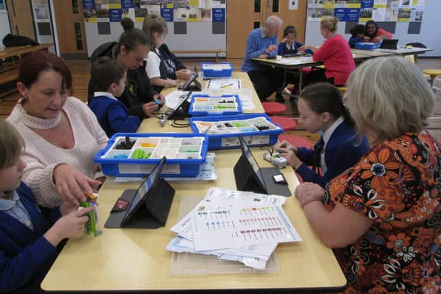 Getting up to speed with technology. A parent/ child learning experience at Eldon Primary school before the Coronavirus lockdown.