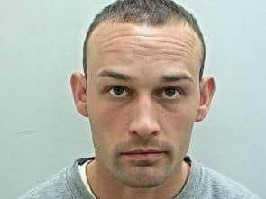Joseph Fisher, 30, of Grange Avenue, is described as white, 6ft 1in tall, of medium build, with short, dark-brown hair. Pic: Lancashire Police
