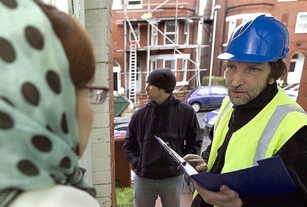 In Fleetwood, a woman was pressured into handing over 12,000 after agreeingto groundworks and fencing after men visited her home unannounced. Note: This is a staged photo for illustrative purposes