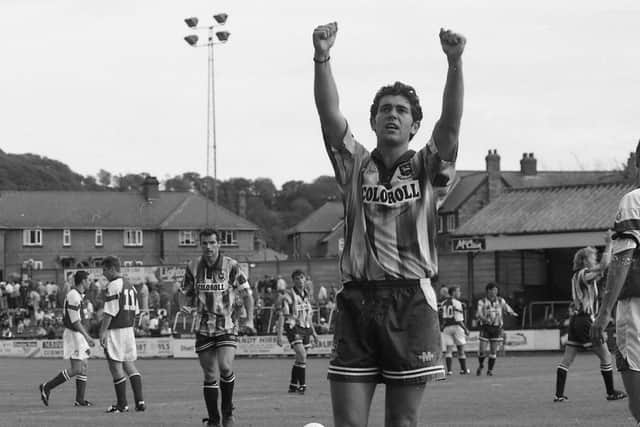 PNE right-back Paul Masefield salutes the North End fans at Scarborough