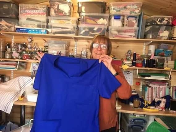 Susan is a volunteer creatingabout 70 to 80 uniform bags a week for NHS workers at Royal Preston Hospital.