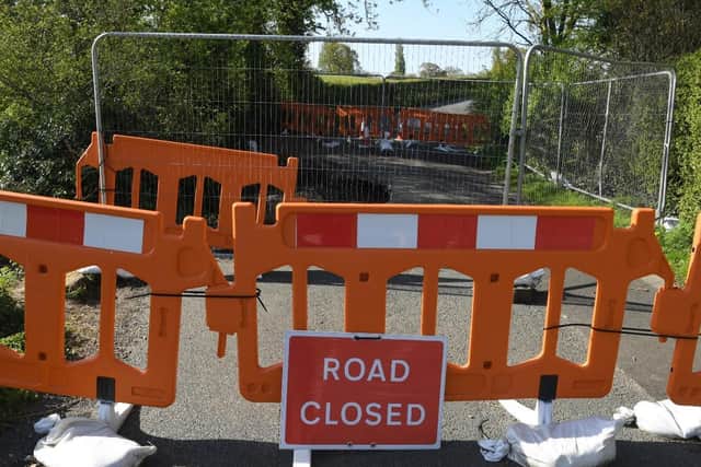 The sinkhole has been cordoned off with barriers and fencing for the safety of the public