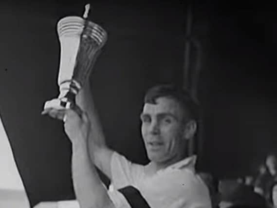 Tom Smith lifting the war cup for Preston North End in 1941
