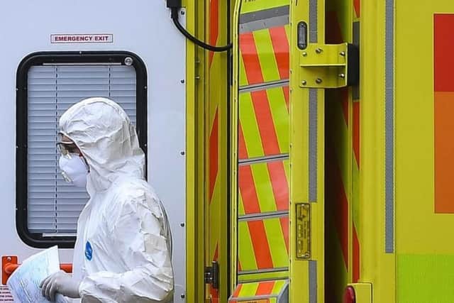 A file image of a medic in personal protective equipment (PPE) outside an ambulance amid the coronavirus Covid-19 pandemic (Picture: Press Association)