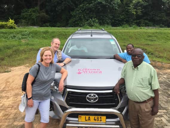 Kentown Wizard Foundation chief executive Margaret Ingram with surgeon and founder of Feet First Steve Mannion on their trip to Malawi, with one of the support vehicles the grant funding has helped purchase