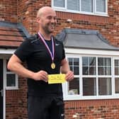 Stuart's 'presentation ceremony' after completing his marathon run