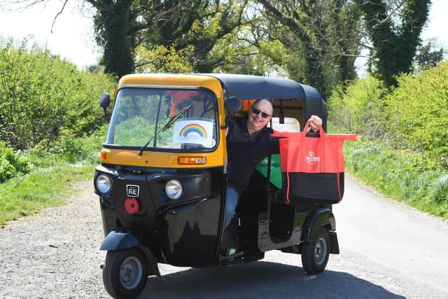 Stuart Richards with his two-year-old auto rickshaw.