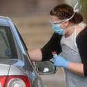 Drive-through testing is available for NHS staff at Preston's College in Fulwood. Credit: Ben Stansall via Getty Images