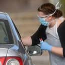 Drive-through testing is available for NHS staff at Preston's College in Fulwood. Credit: Ben Stansall via Getty Images
